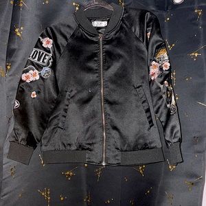 Blue red black yellow orange pink jacket